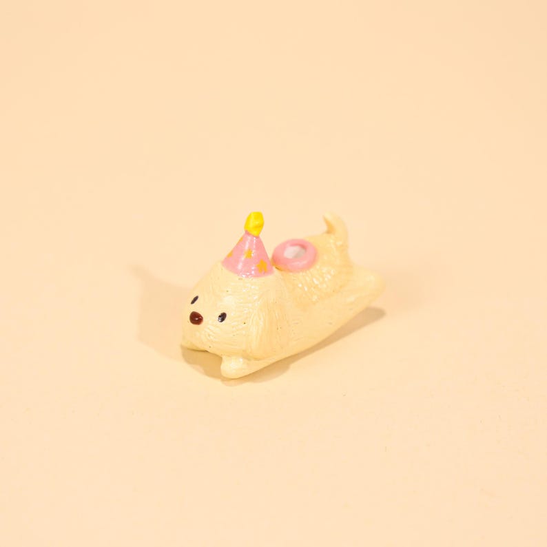 Cremefarbener Welpe Cake Topper mit rosa Partyhut Keramik Kerzenhalter Geburtstagsdekoration Hund Kuchen Dekor